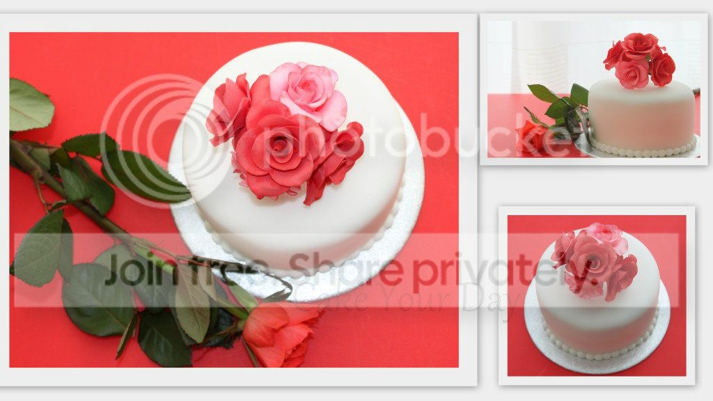 http://i859.photobucket.com/albums/ab151/CakeYourDay/Bruidstaarten%20Wedding%20Cakes/Bruidstaartwitmetrozen.jpg